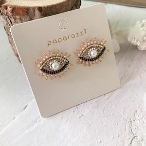 Evil eyes earrings.